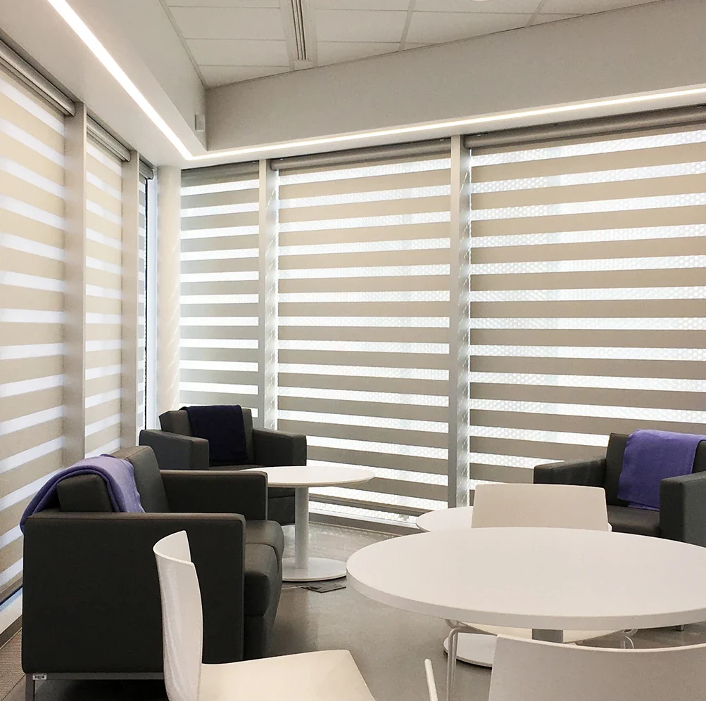Cream dual shades around a seating area