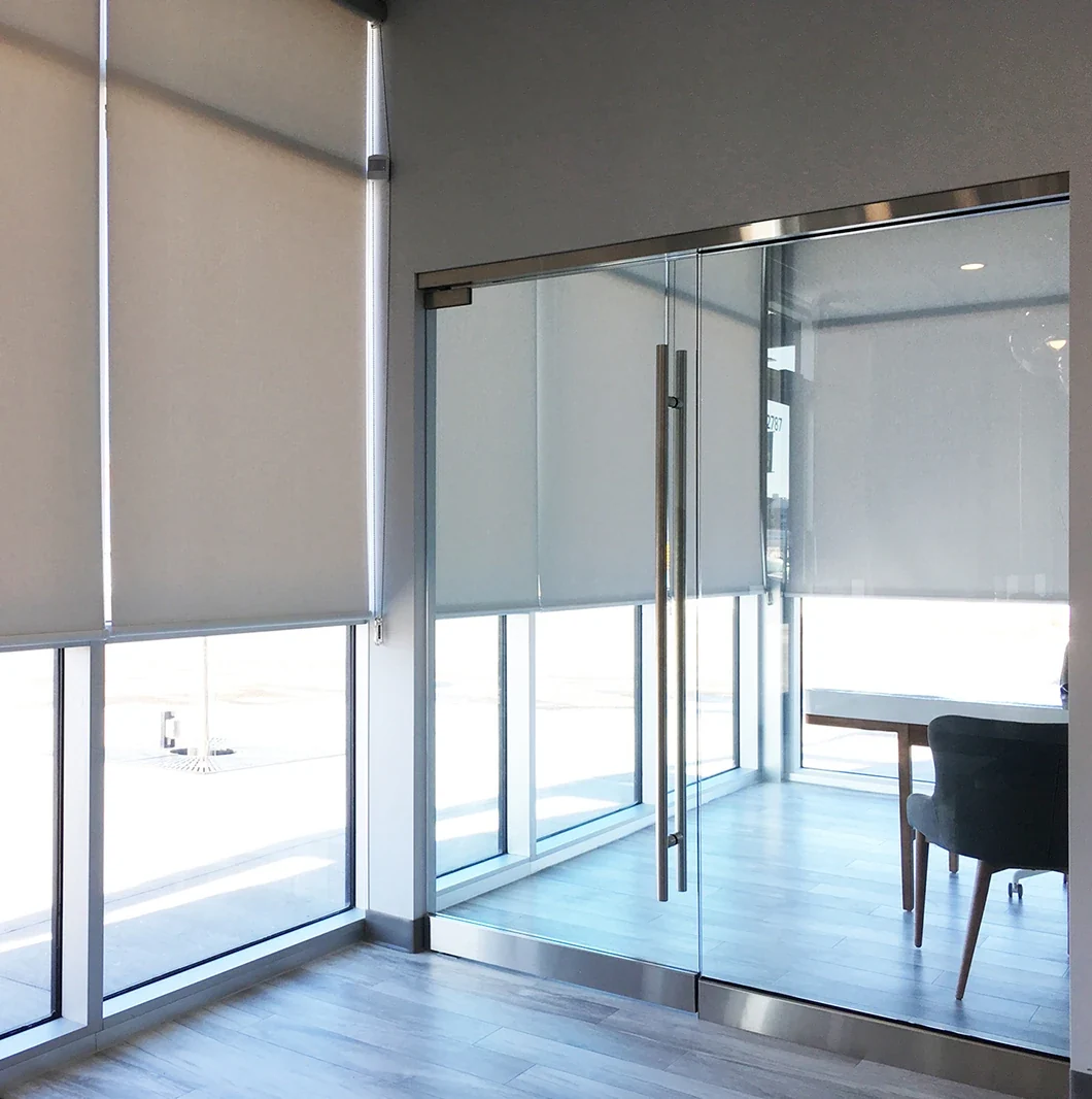 Light roller shades in a commercial entrance